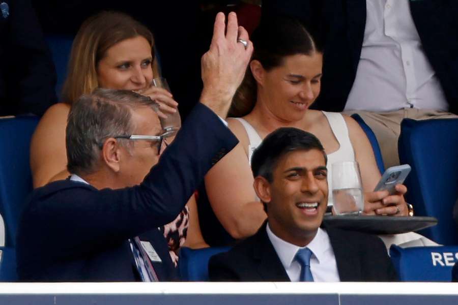 Britain's Prime Minister Rishi Sunak (front row R) at Lord's