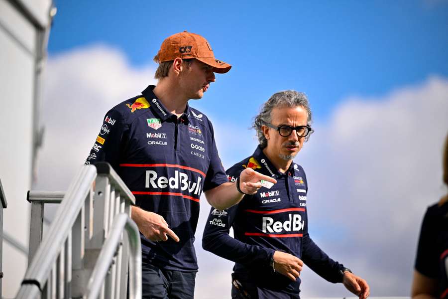 Max Verstappen speaks with team principal Laurent Mekies before practice for the US Grand Prix in Austin
