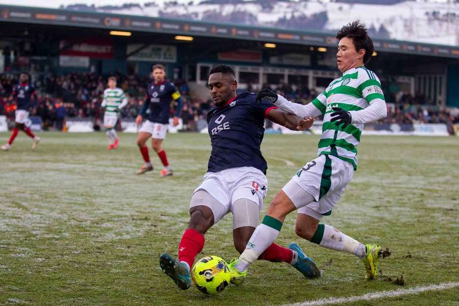 Ross County's Akil Wright tackles Celtic's Hyunjun Yang