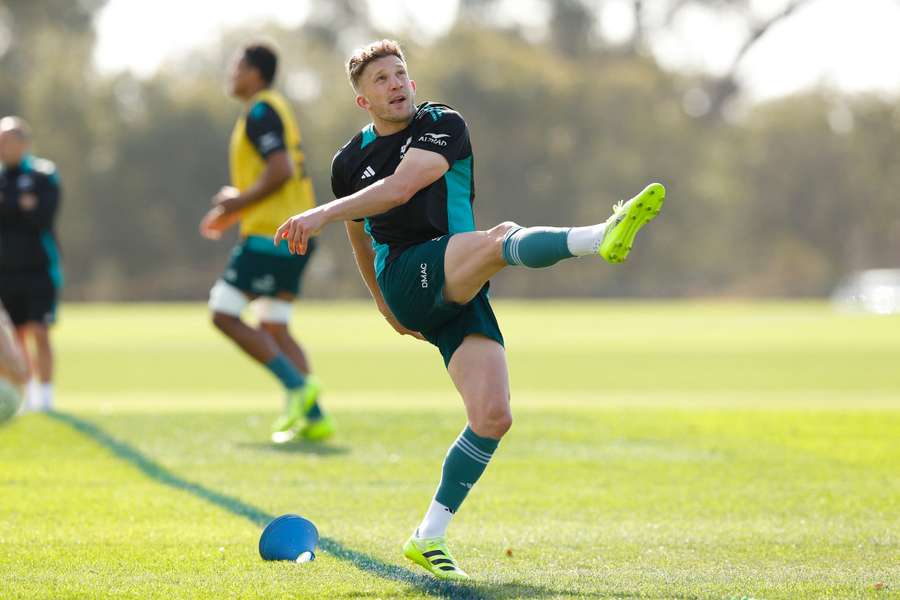 Beauden Barrett takes a kick during the All Blacks' captains run last week.
