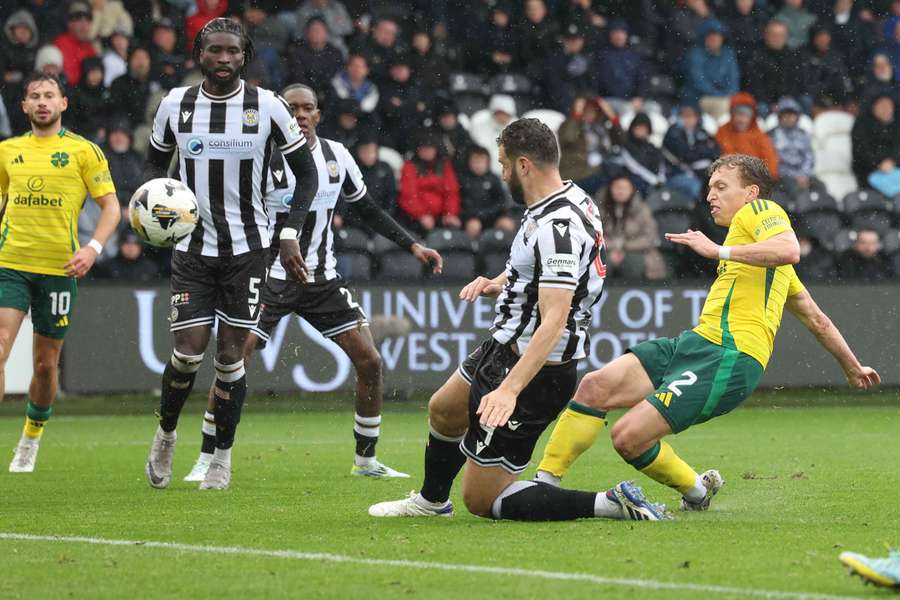 Alastair Johston of Celtic scores his team's third goal