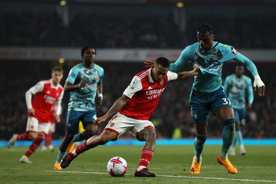 Arsenal's Brazilian striker Gabriel Jesus vies with Southampton's German defender Armel Bella-Kotchap