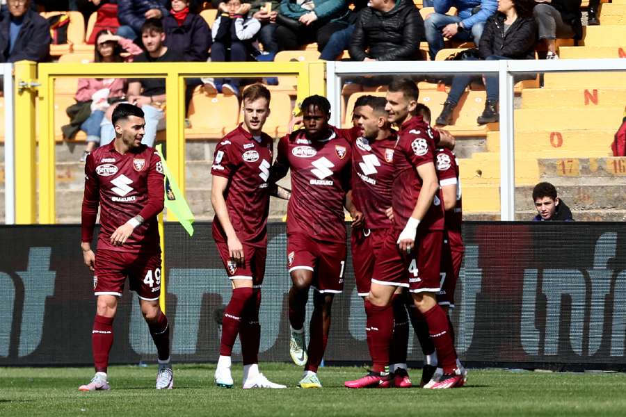 Torino players celebrating a goal
