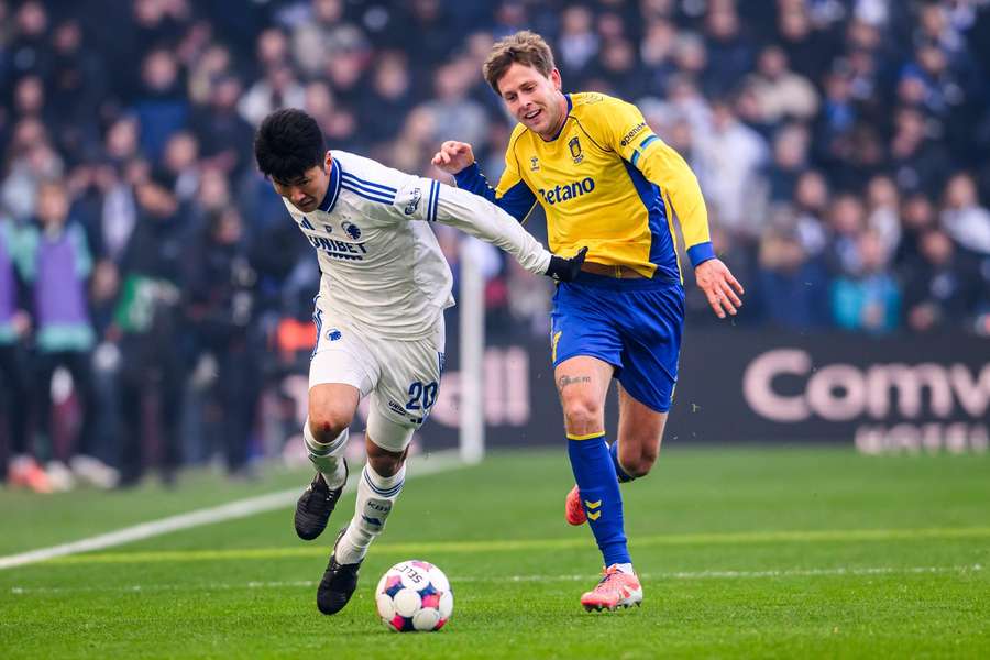 FC Copenhagen's Junnosuke Suzuki and Brondby's Nicolai Vallys battle for the ball