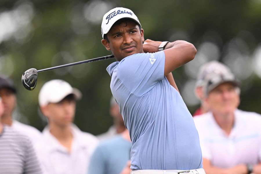 Dylan Naidoo of South Africa plays his tee shot on the eighth hole during the third round of the Investec South African Open Championship