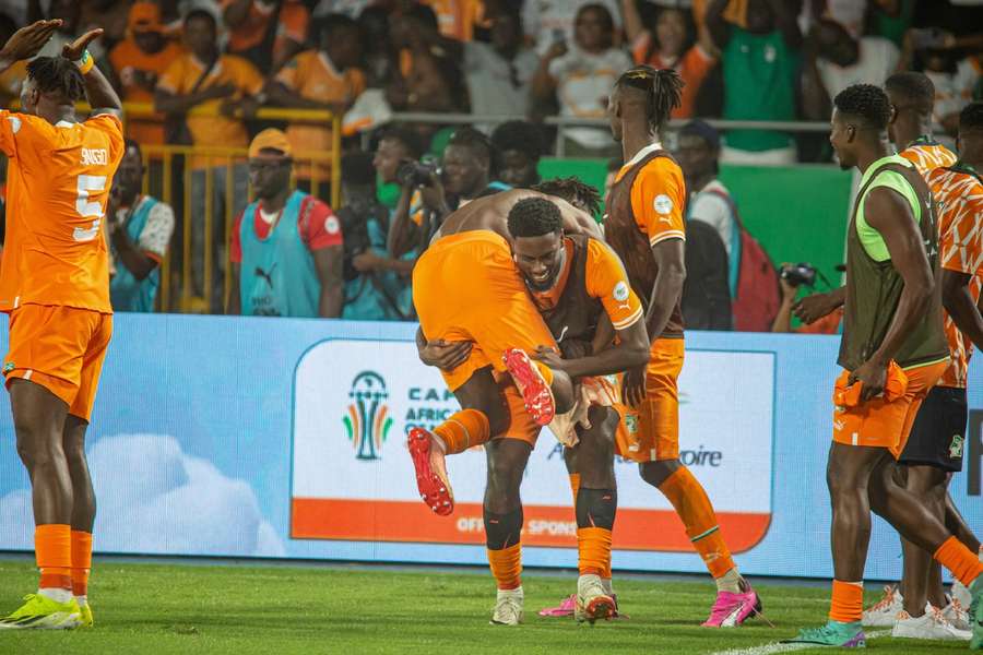 Ivory Coast celebrate beating defending champions Senegal