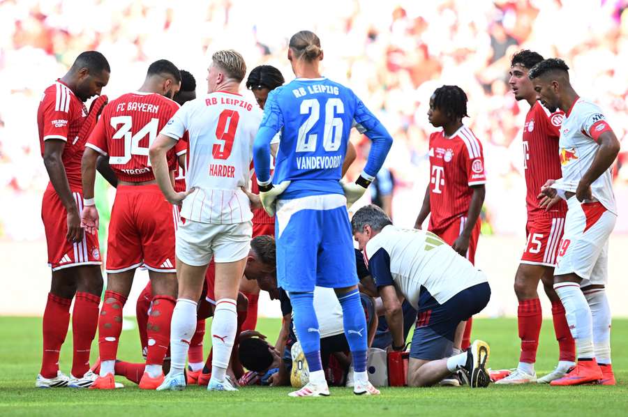 Jamal Musiala receives treatment during pre-season