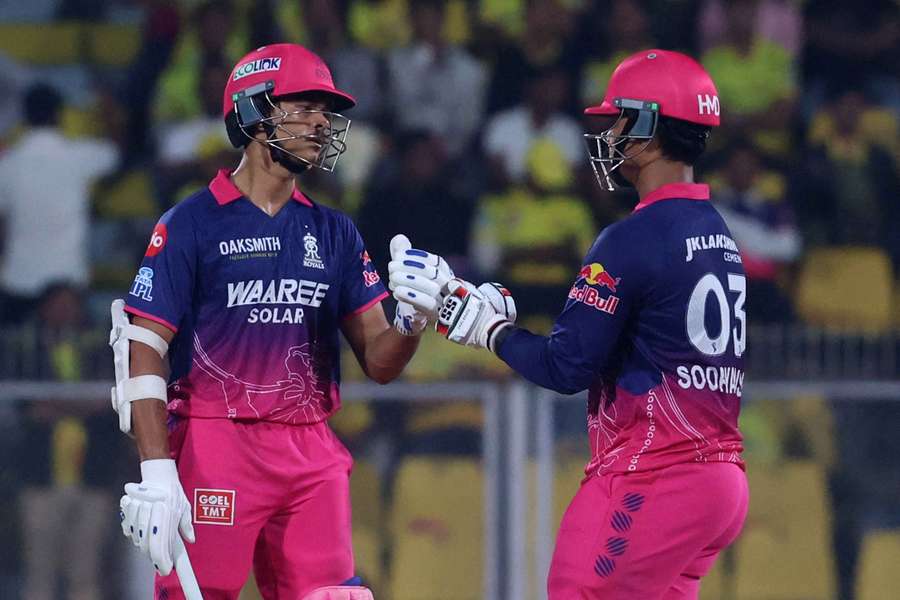 Rajasthan Royals' Vaibhav Sooryavanshi and Yashasvi Jaiswal interact between the wickets