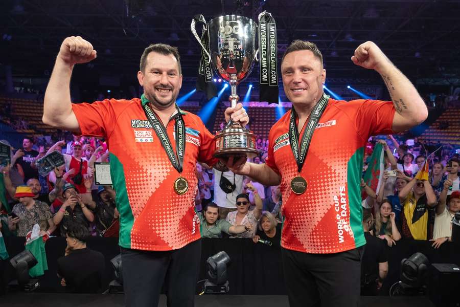Price and Clayton deliver Wales second World Cup of Darts title after win over Scotland