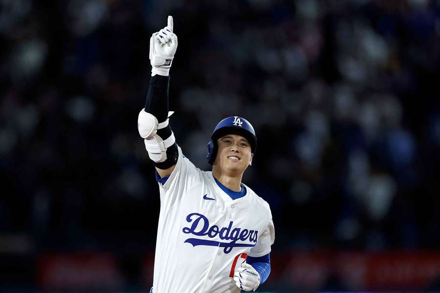 Los Angeles Dodgers' Shohei Ohtani celebrating a walk-off home run