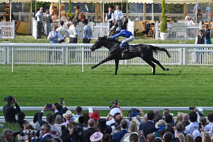 Jockey Jim Crowley rides Mostahdaf to win the Prince Of Wales's Stakes