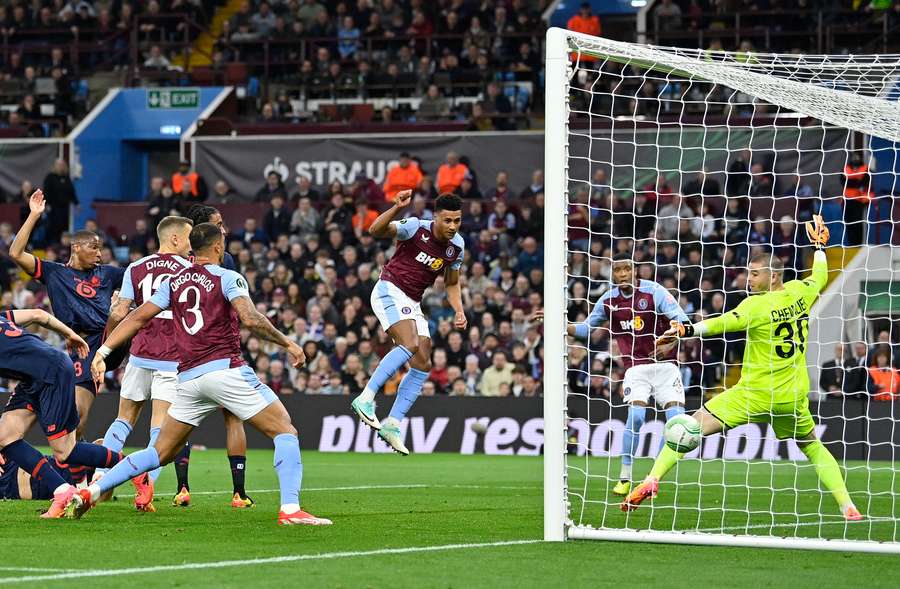 Aston Villa's English striker #11 Ollie Watkins scores the opening goal