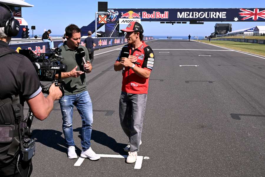 Marc Marquez conducts a TV interview on the Phillip Island straight on Thursday. Marc Marquez conducts a TV interview on the Phillip Island straight on Thursday.