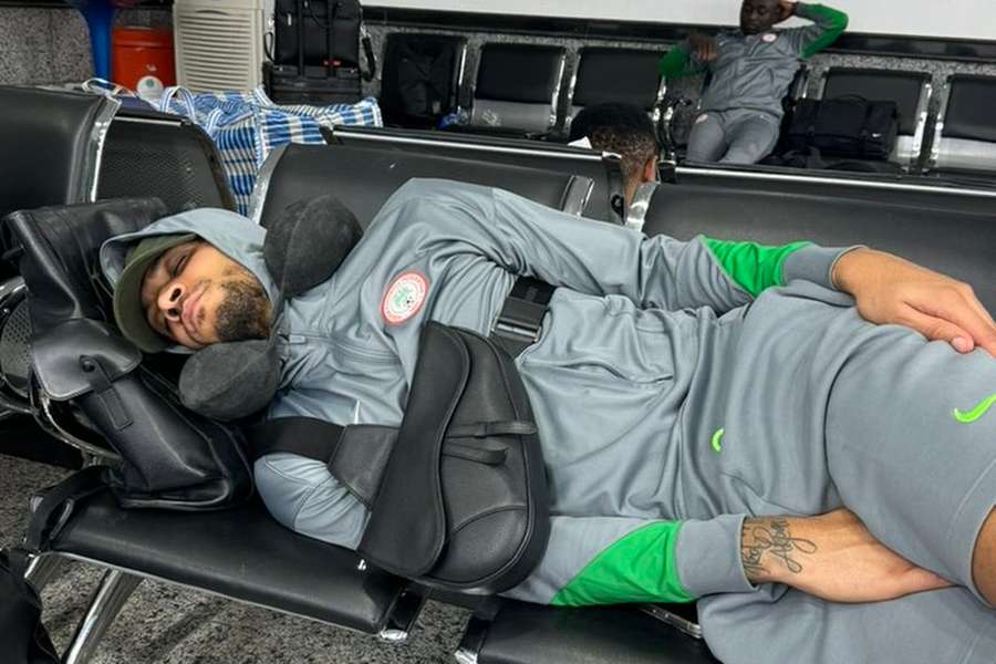 Nigeria's players sleep in the terminal