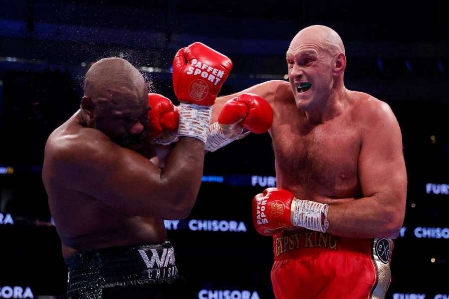 Fury taunts Usyk after beating Chisora to retain WBC title