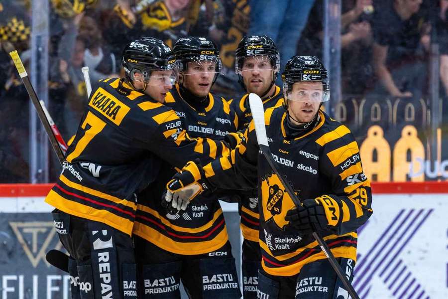 Skelleftea players celebrate their sixth goal against Lulea Skelleftea players celebrate their sixth goal against Lulea
