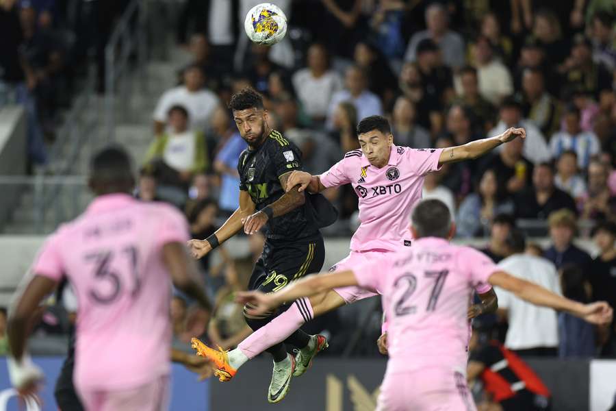 Denis Bouanga of Los Angeles FC and Tomás Avilés of Inter Miami CF battle for the ball