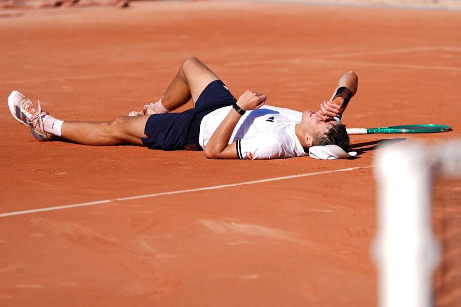 Jakub Mensik collapses on court after beating Mariano Navone Jakub Mensik collapses on court after beating Mariano Navone