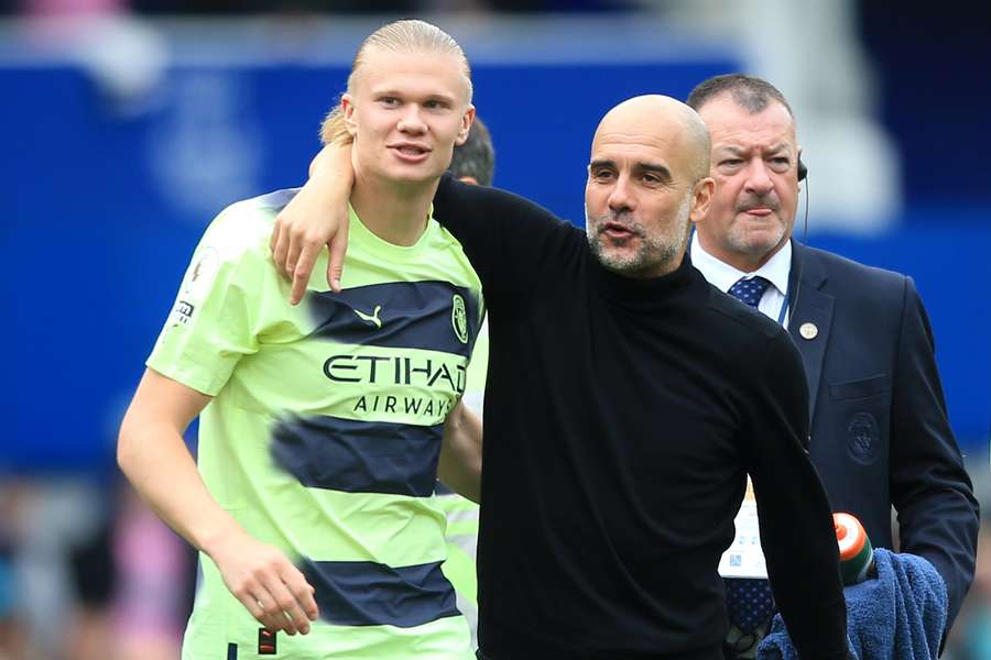 Guardiola e Haaland após a vitória contra o Everton