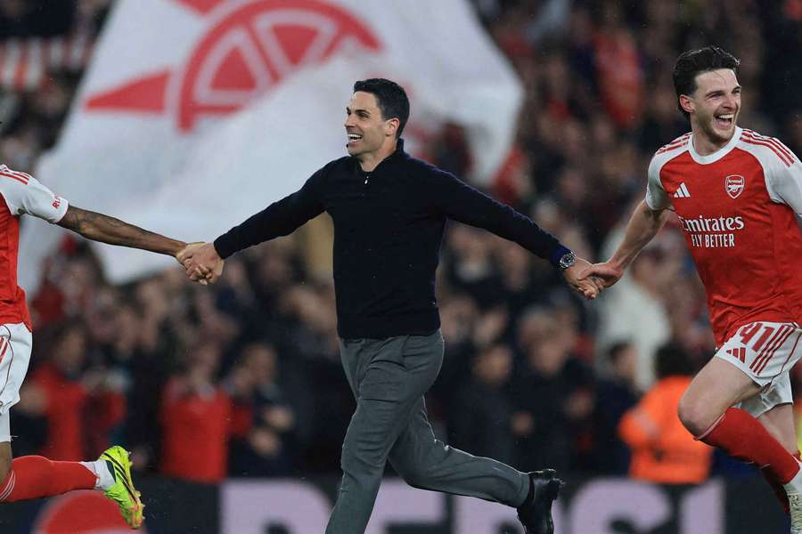 Arteta celebrating with his players.