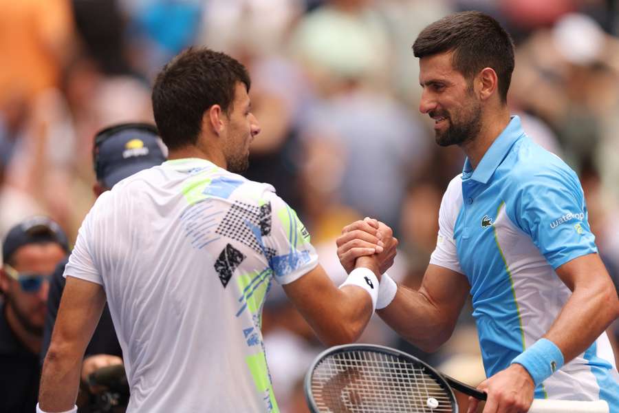 Djokovic and Zapata Miralles shake hands after their encounter