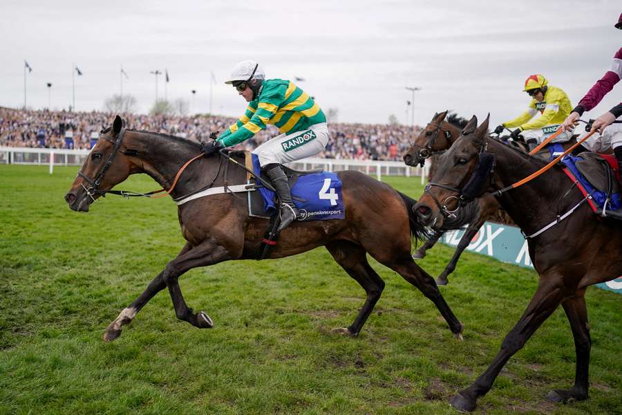 Nico de Boinville riding Jonbon to win the Melling Chase at Aintree