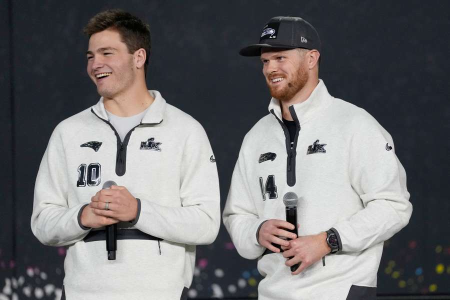 New England Patriots quarterback Drake Maye (L) next to Seattle Seahawks quarterback Sam Darnold during the Super Bowl Opening Night