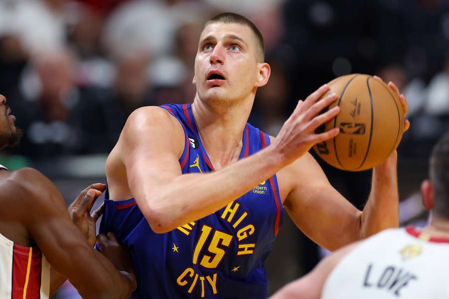 Nikola Jokic #15 of the Denver Nuggets drives the lane during the first quarter against the Miami Heat in Game Three