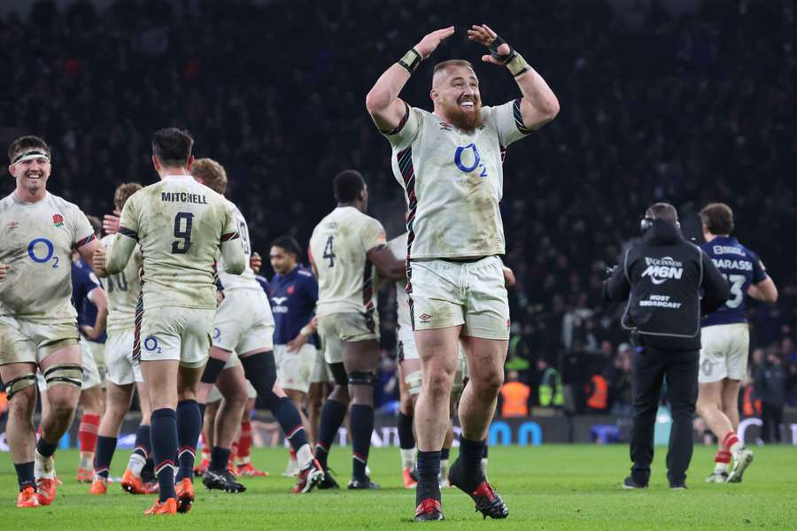 England celebrate after beating France at the Allianz Stadium in Twickenham
