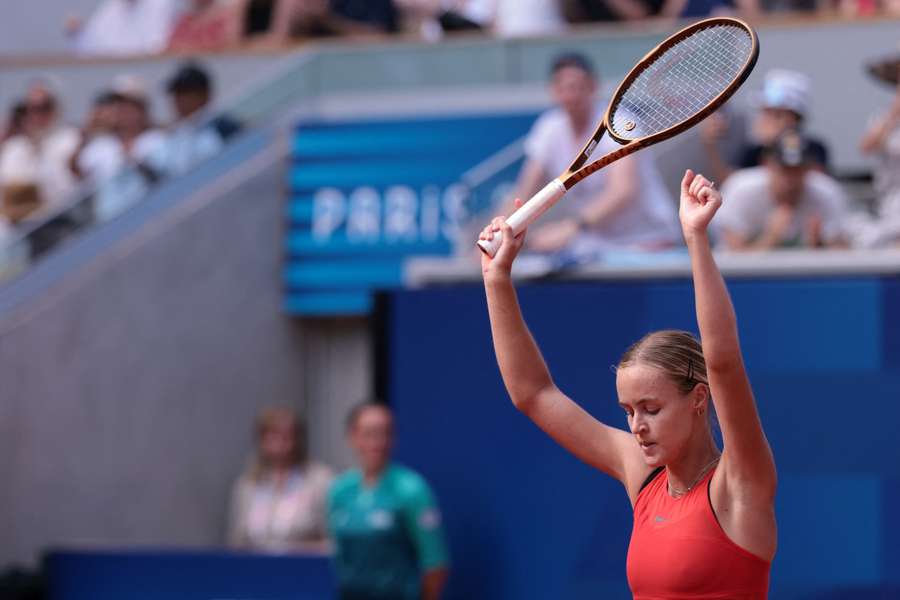 Anna Karolina Schmiedlova of Slovakia celebrates after winning