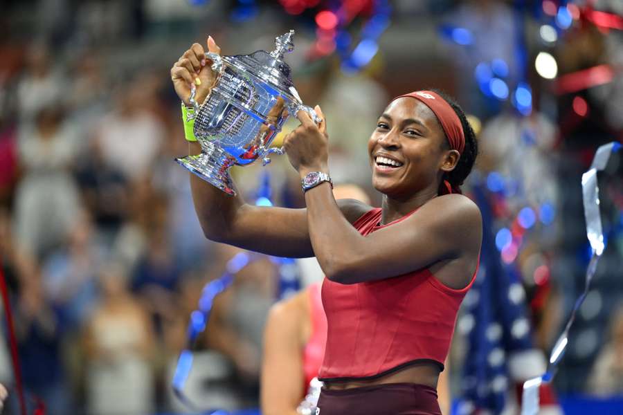 USA's Coco Gauff poses with the trophy
