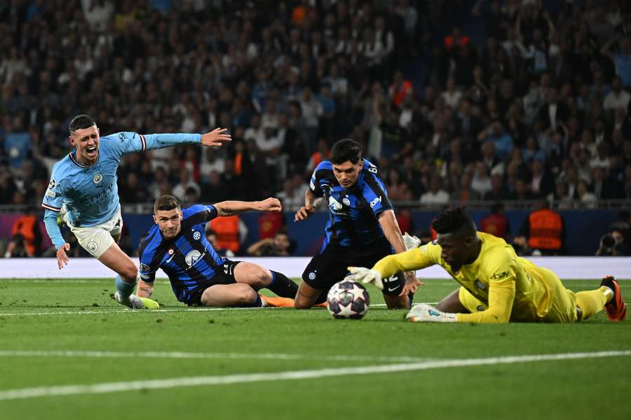 Phil Foden sees his shot saved