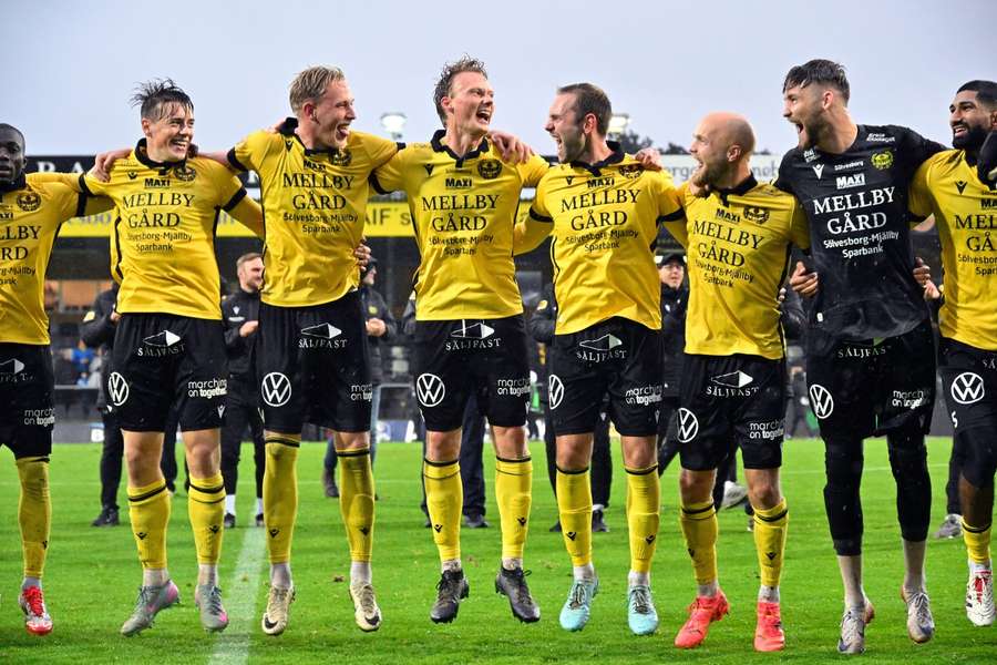Mjallby players celebrate at full-time