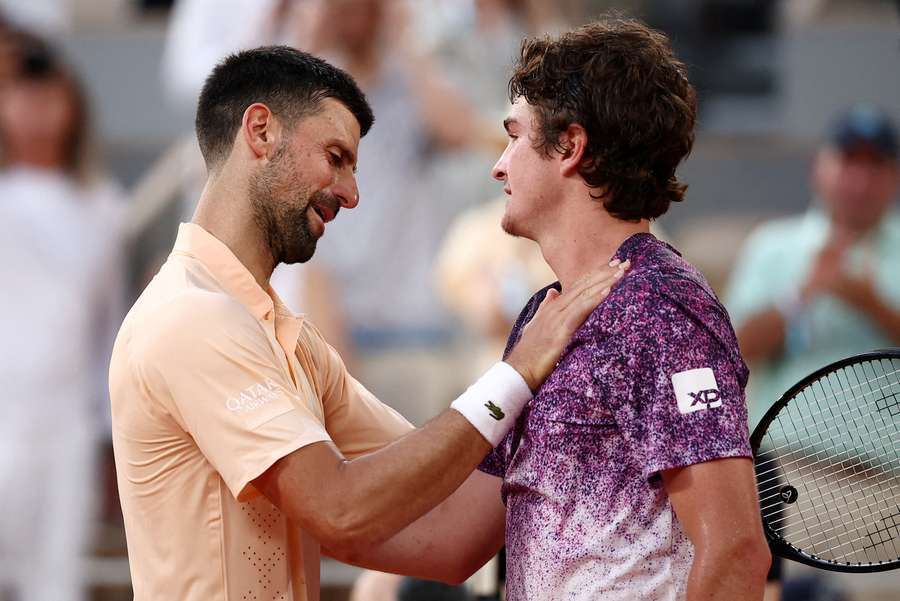 Novak Djokovic congratulates Joao Fonseca