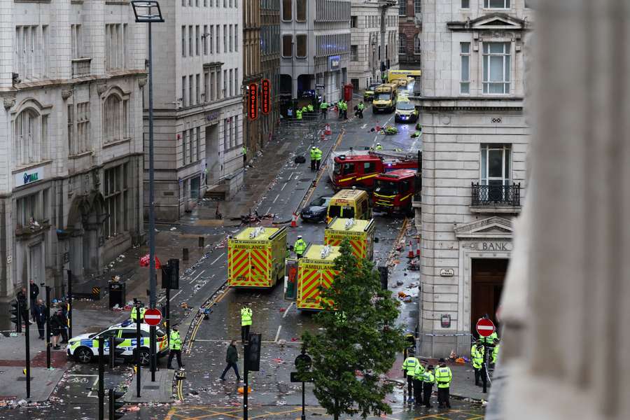 Police officers investigate the scene in Water Street