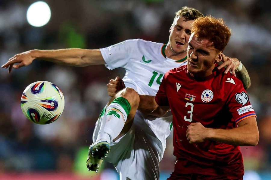 Ireland's Jack Taylor (L) and Erik Piloyan of Armenia