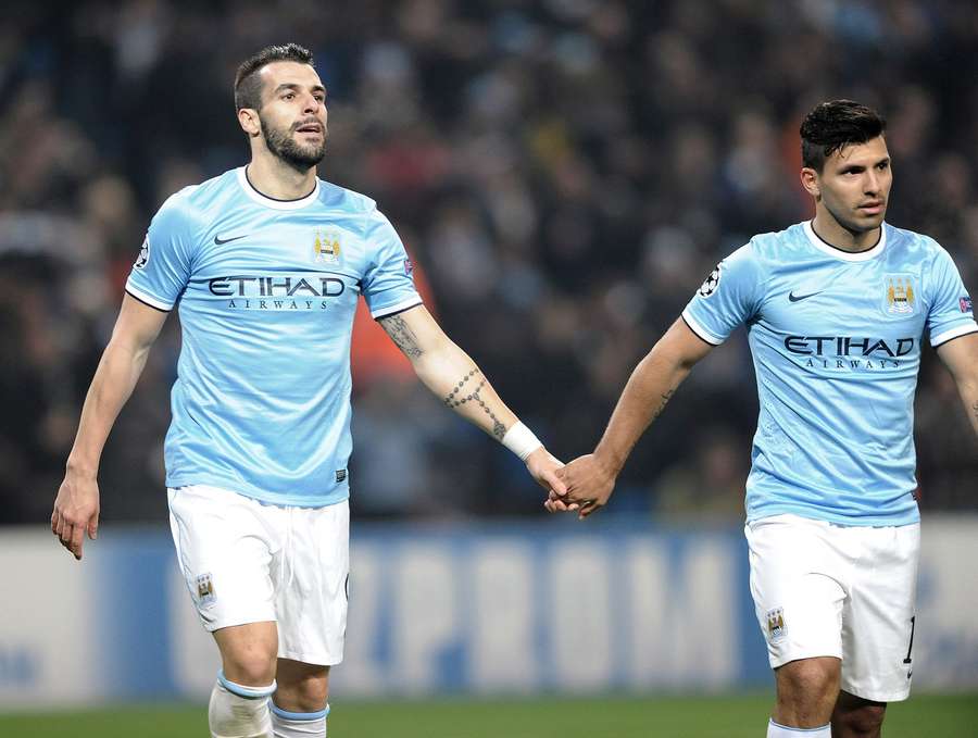 Negredo and Aguero celebrate a goal for Man City Negredo and Aguero celebrate a goal for Man City