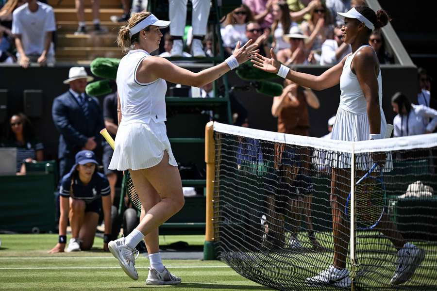 Anastasia Pavlyuchenkova shakes hands with Naomi Osaka