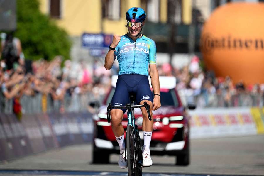 Alberto Bettiol celebrates with fans after winning the 13th stage of the Giro d'Italia Alberto Bettiol celebrates with fans after winning the 13th stage of the Giro d'Italia