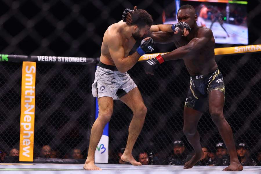 Israel Adesanya competes with Nassourdine Imavov in their men's middleweight fight