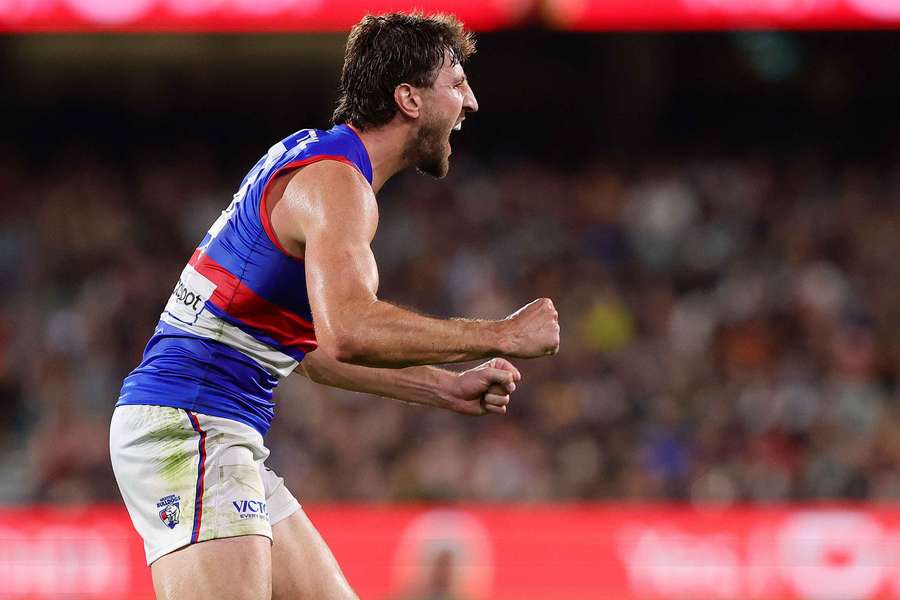 Marcus Bontempelli roars when the siren sounds to complete the Bulldogs' memorable win in Adelaide. Marcus Bontempelli roars when the siren sounds to complete the Bulldogs' memorable win in Adelaide.
