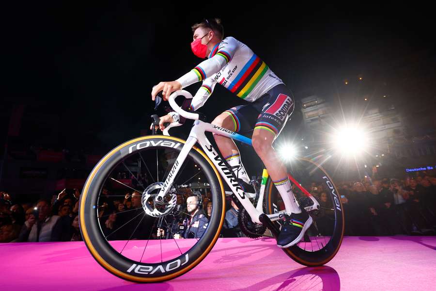 Quick Step's Belgian rider Remco Evenepoel cycles on stage during the opening ceremony 