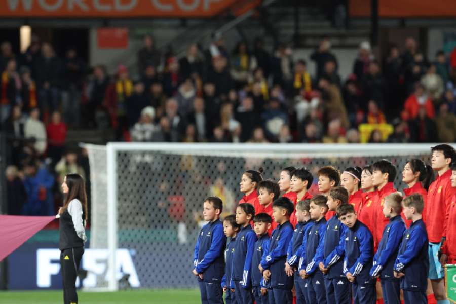 China line up before their 1-0 victory over Haiti