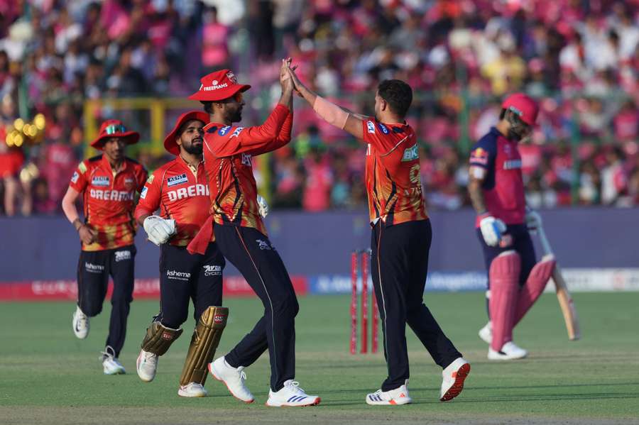 Azmatullah Omarzai celebrates after taking the wicket of Sanju Samson