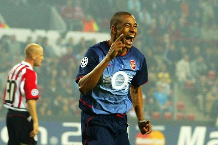 Gilberto Silva celebrating one of his goals in an Arsenal shirt