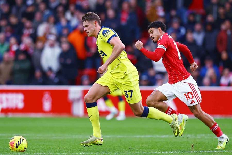 Tottenham's Micky van de Ven is chased by Nottingham Forest's Morgan Gibbs-White