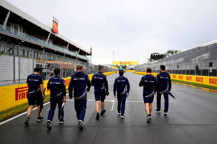 Some of the teams walk the track during previews to the Canadian Grand Prix