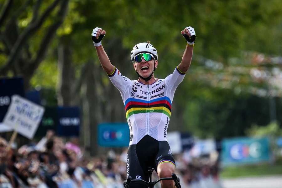 Tadej Pogacar celebrates victory