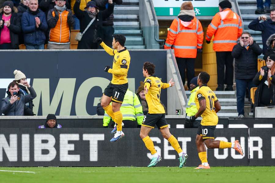 Hwang celebrates after scoring for Wolves
