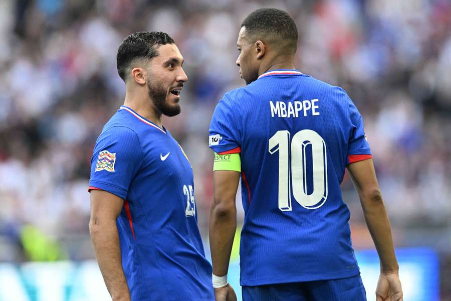 France's Kylian Mbappe (right) celebrates with Rayan Cherki after scoring against Germany